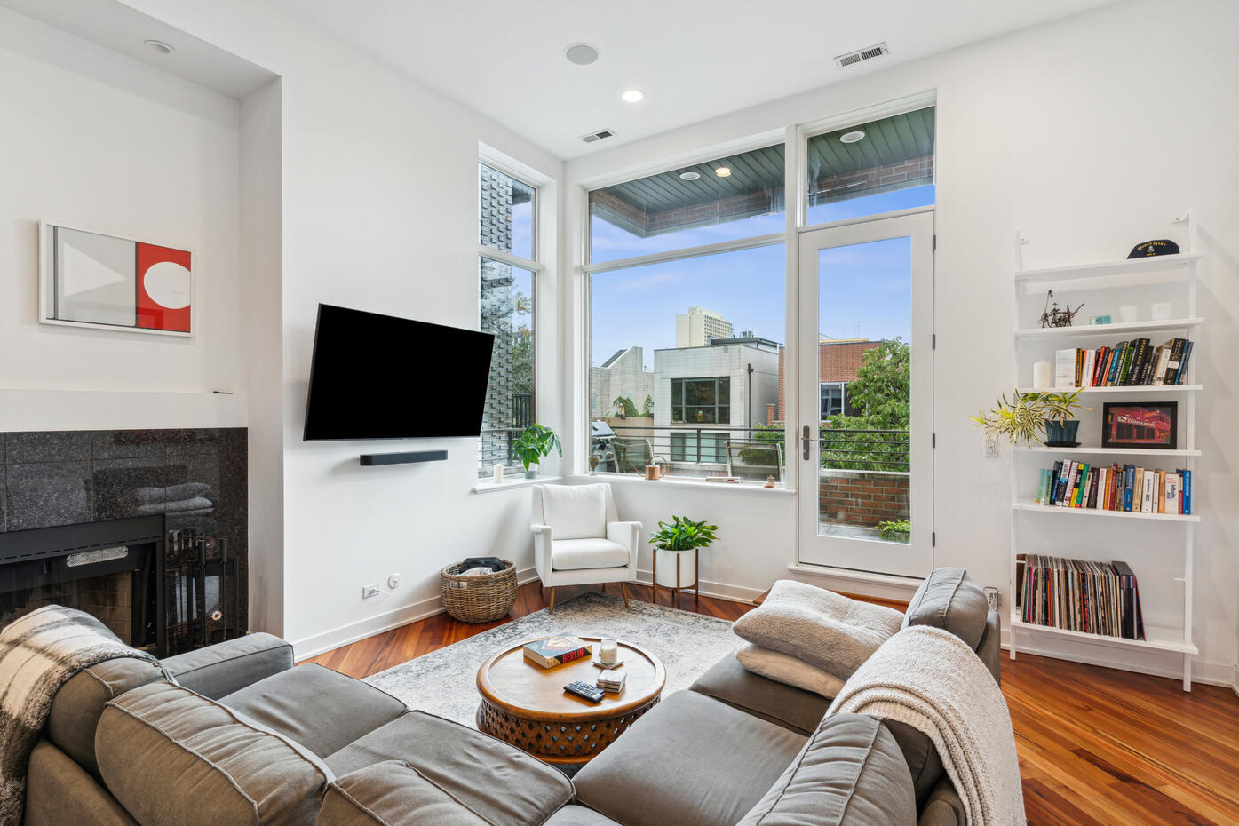 Chicago living room real estate photography with fireplace and large windows